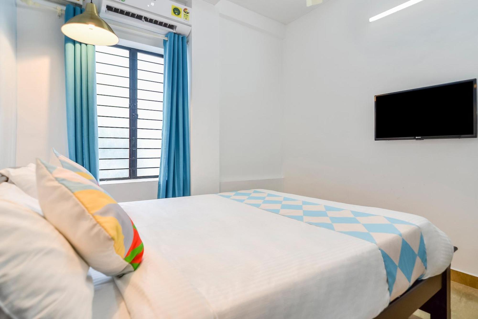 Hotel O Pop Tavern Thiruvananthapuram Buitenkant foto